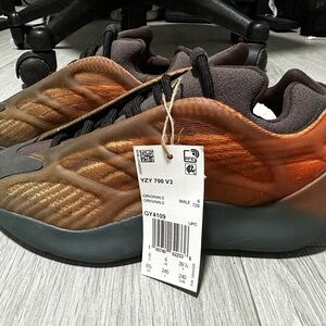 Yeezy Sneakers in Orange and Gray with Slip-On Style and Ribbed Texture